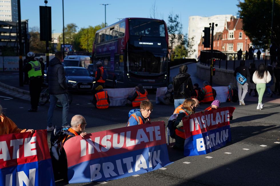 Protesters from Insulate Britain blocking Great Charles Street Queensway in Birmingham. Picture date: Tuesday November 2, 2021.