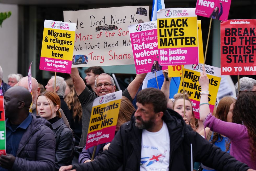Protesters gather outside Perth Concert Hall in Perth, Scotland