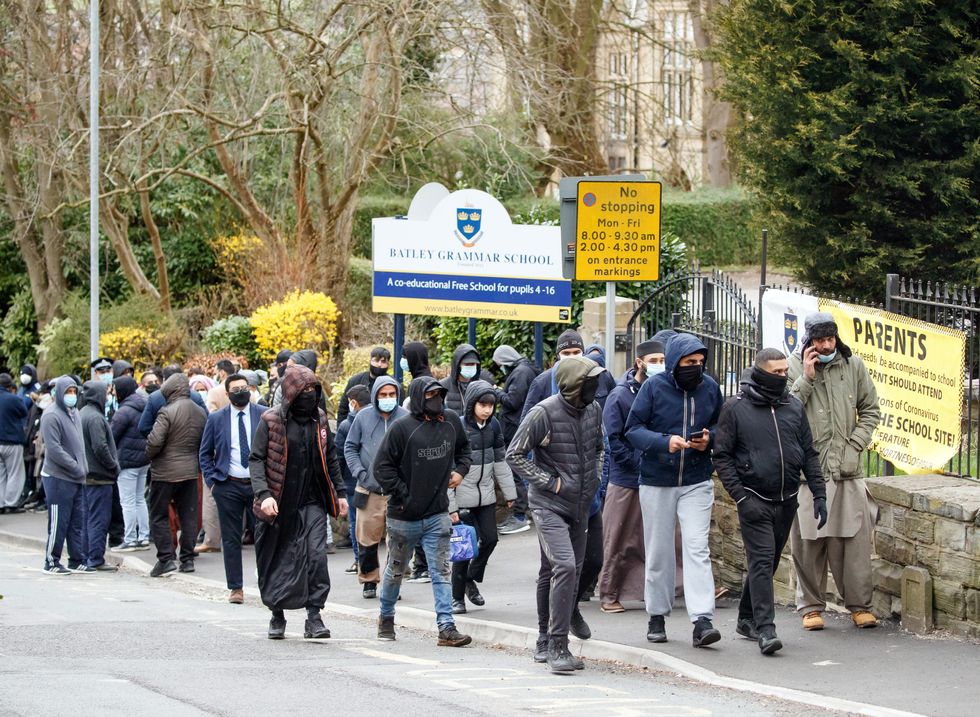 Protesters gathered outside Batley Grammar School in Batley, West Yorkshire