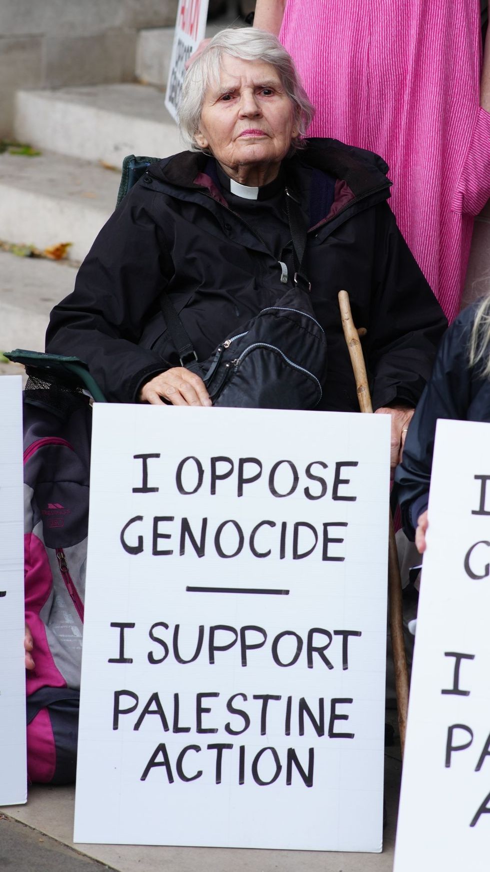 Protesters held up signs reading: 'I oppose genocide, I support Palestine Action'\u200b