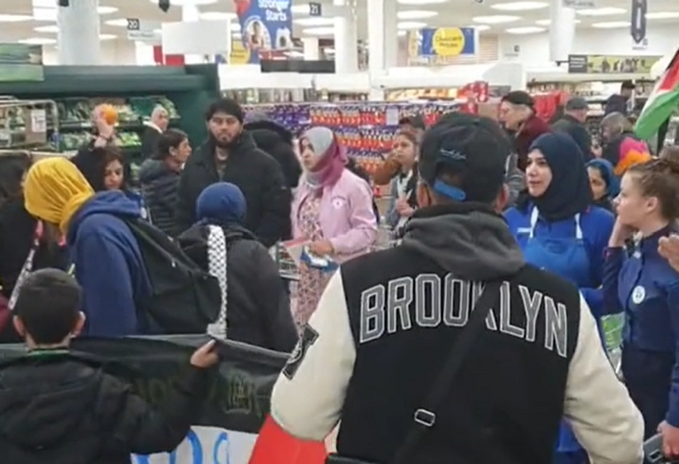 protesters inside a supermarket