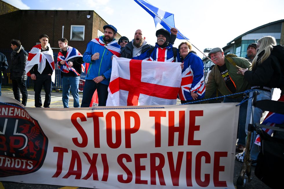 Protesters outside RNLI Poole