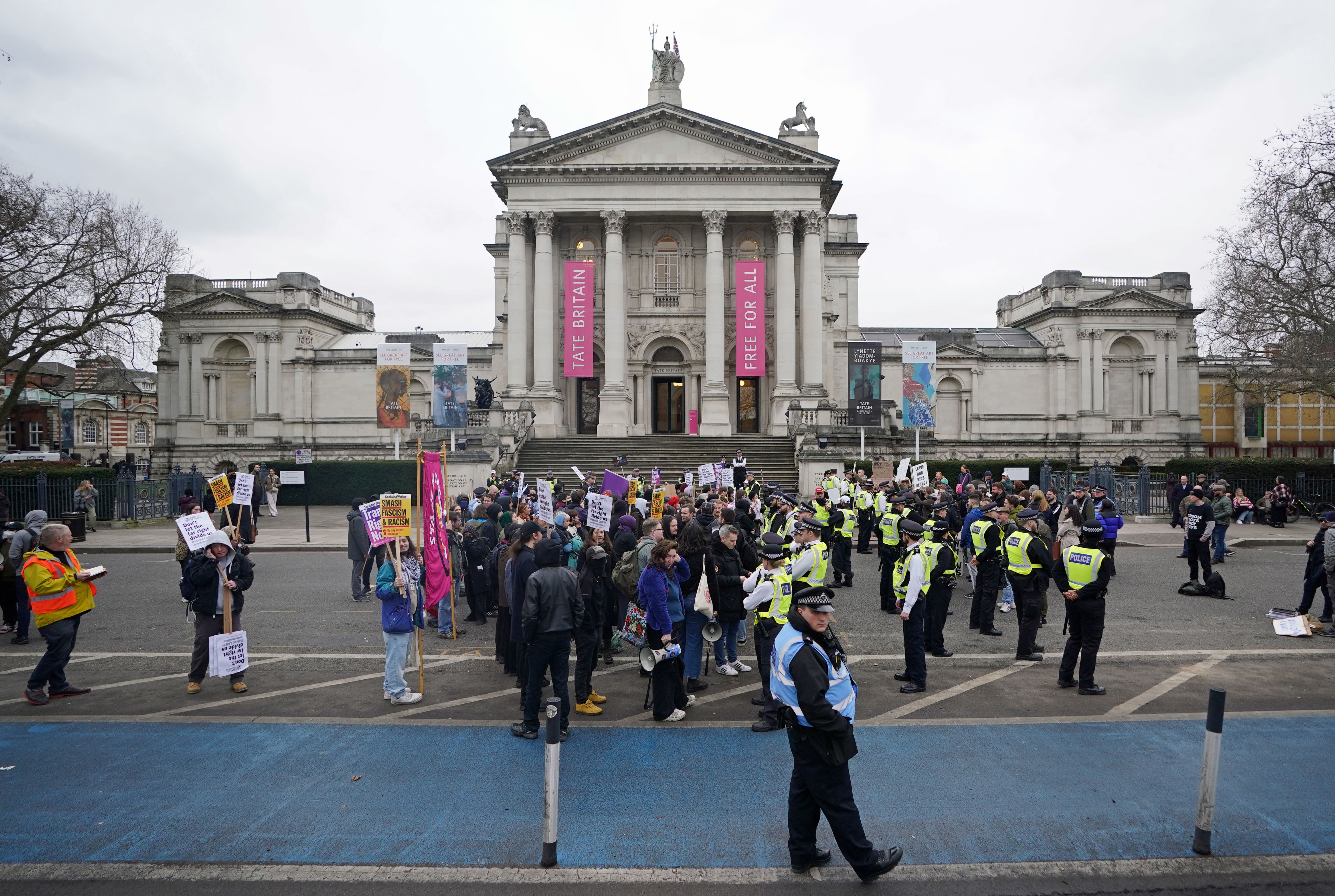 Protesters outside the Tate Britain, which is hosting 'Drag Queen Story Hour UK' with tales told by Aida H Dee, who the gallery's website describes as %22the first drag artist in Europe to read stories to children in a nursery%22. Writing on twitter, the drag queen said the day had been %22proper emotional%22, adding that five protesters had gained entry to the Tate and %22caused a disruption%22 in parts of the building, but they did not affect the readings. Picture date: Saturday February 11, 2023.