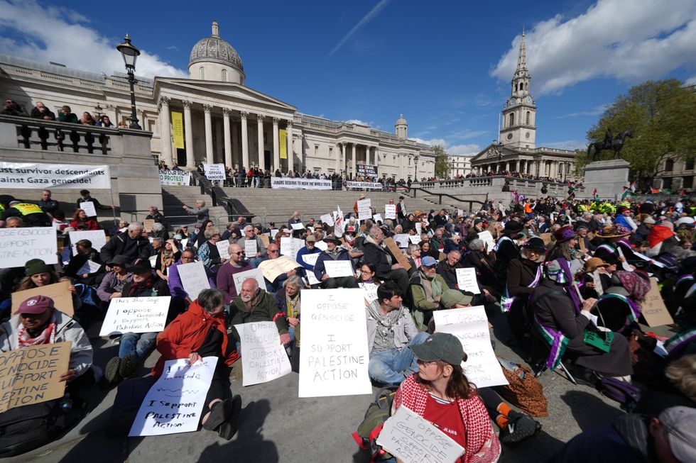 Protesters supporting Palestine Action in Trafalgar Square