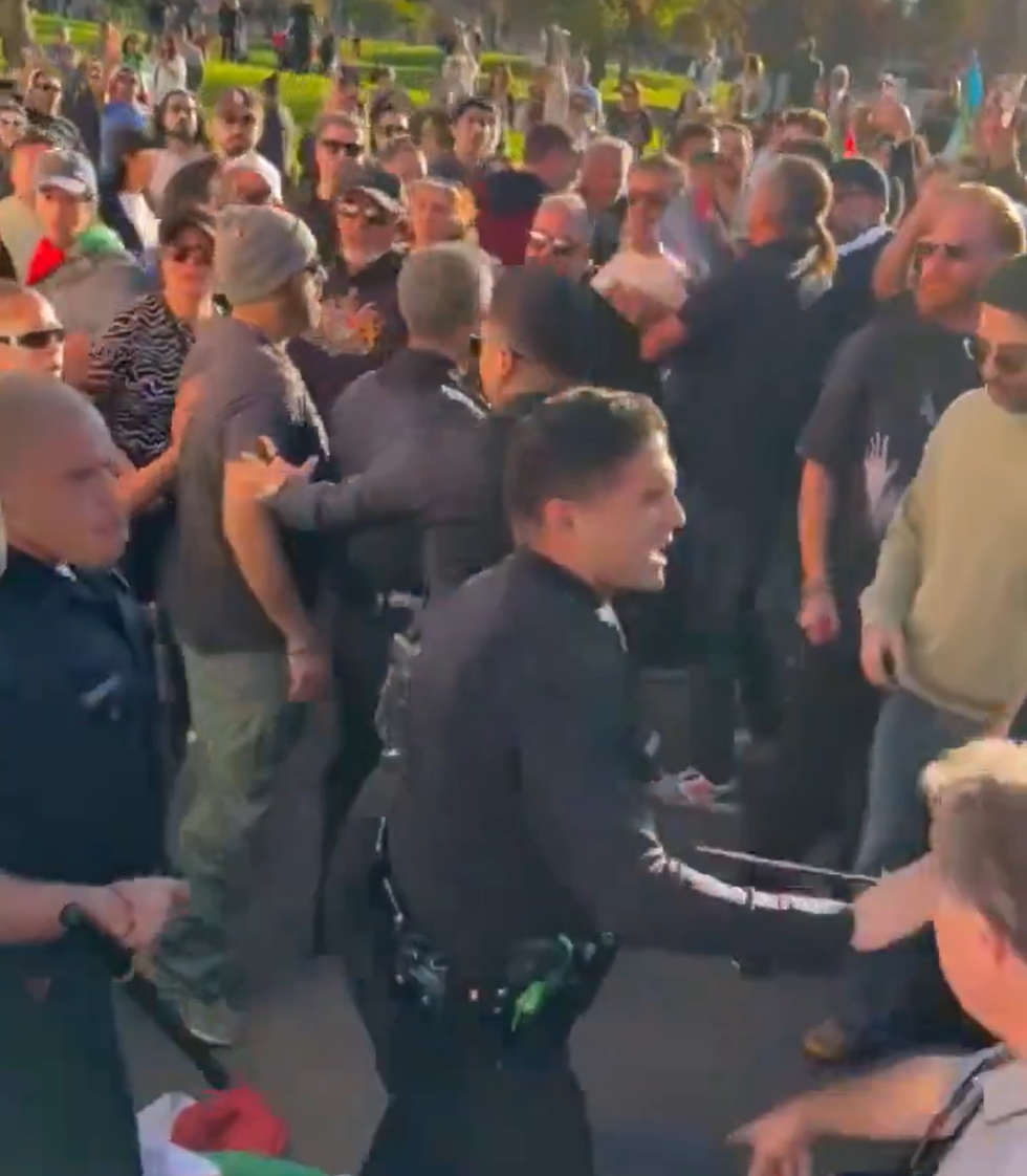 Protesters try to reach LA truck driver