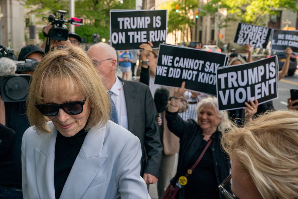 Protesters waited outside the court house
