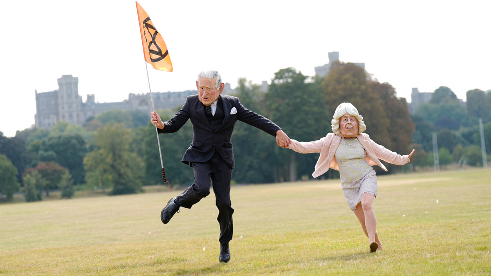 Protesters with Charles and Camilla masks