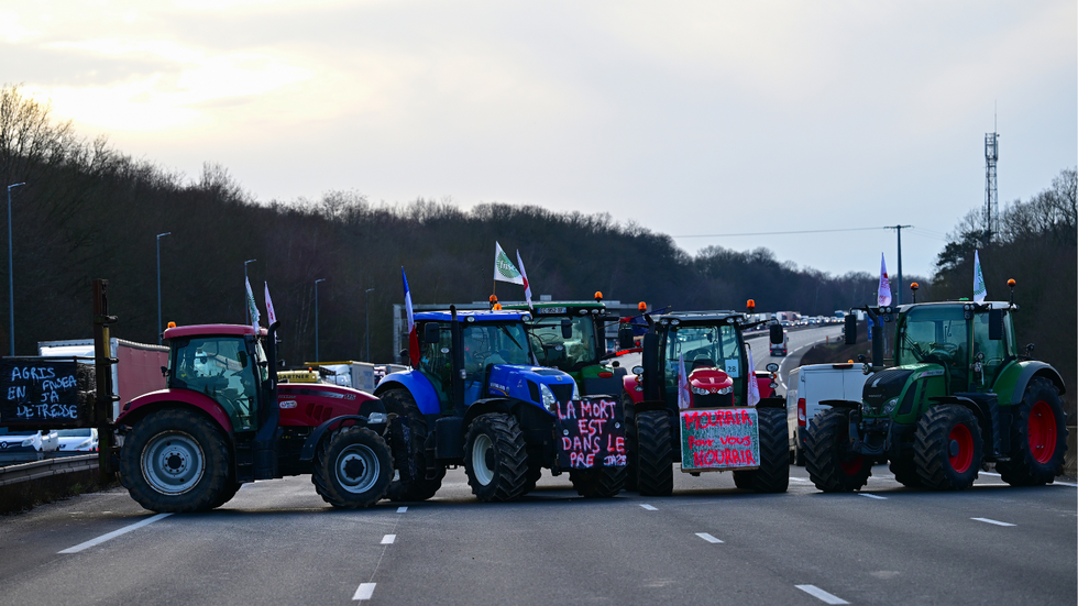 Protesting farmers blockade the A10 highway with tractors