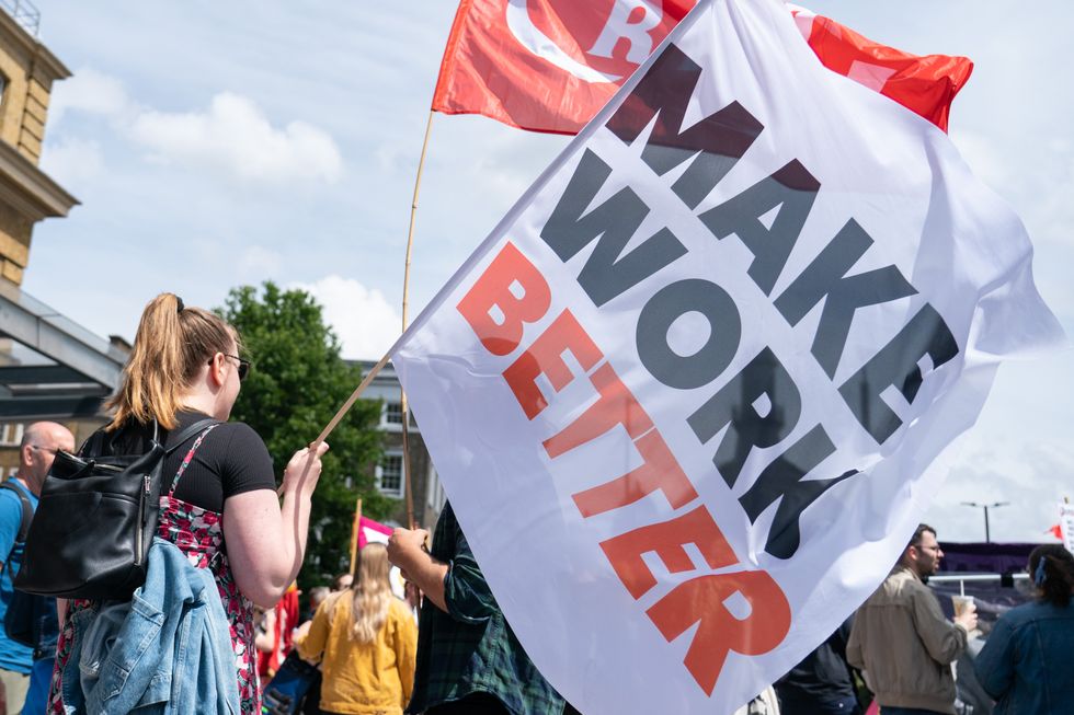 Protestors attend a rally outside Kings Cross station, London, as train services continue to be disrupted following the nationwide strike by members of the Rail, Maritime and Transport (RMT) union in a bitter dispute over pay, jobs and conditions. Picture date: Saturday June 25, 2022.