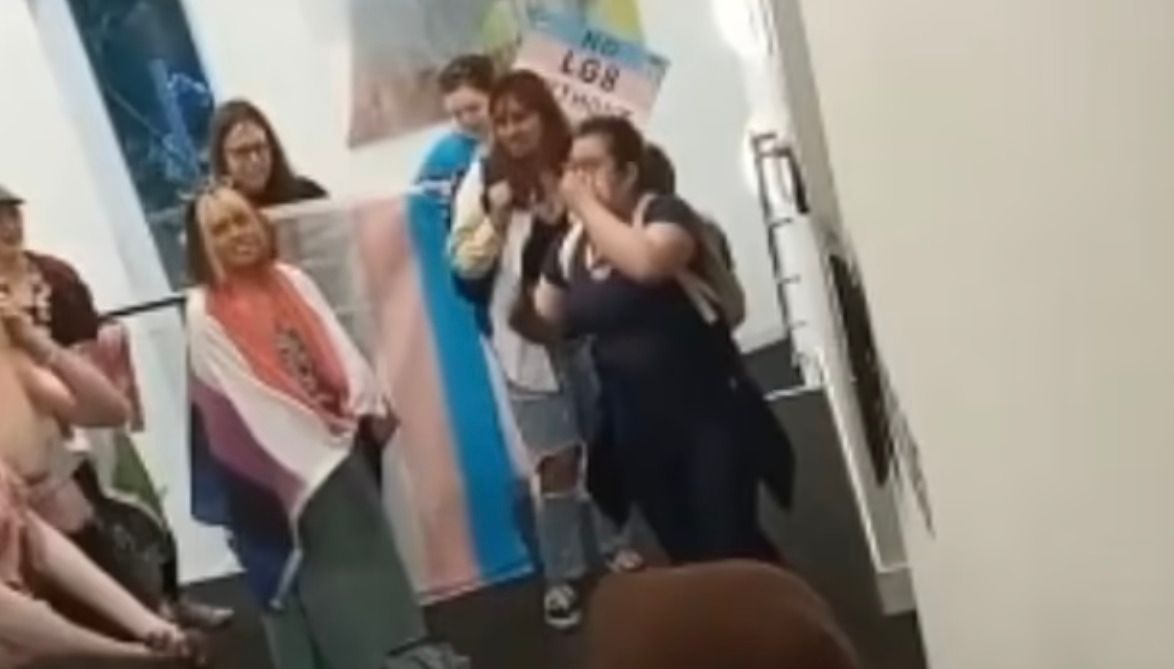 Protestors brandished the transgender flag whilst shouting %22tory scum%22 at Mr Zahawi