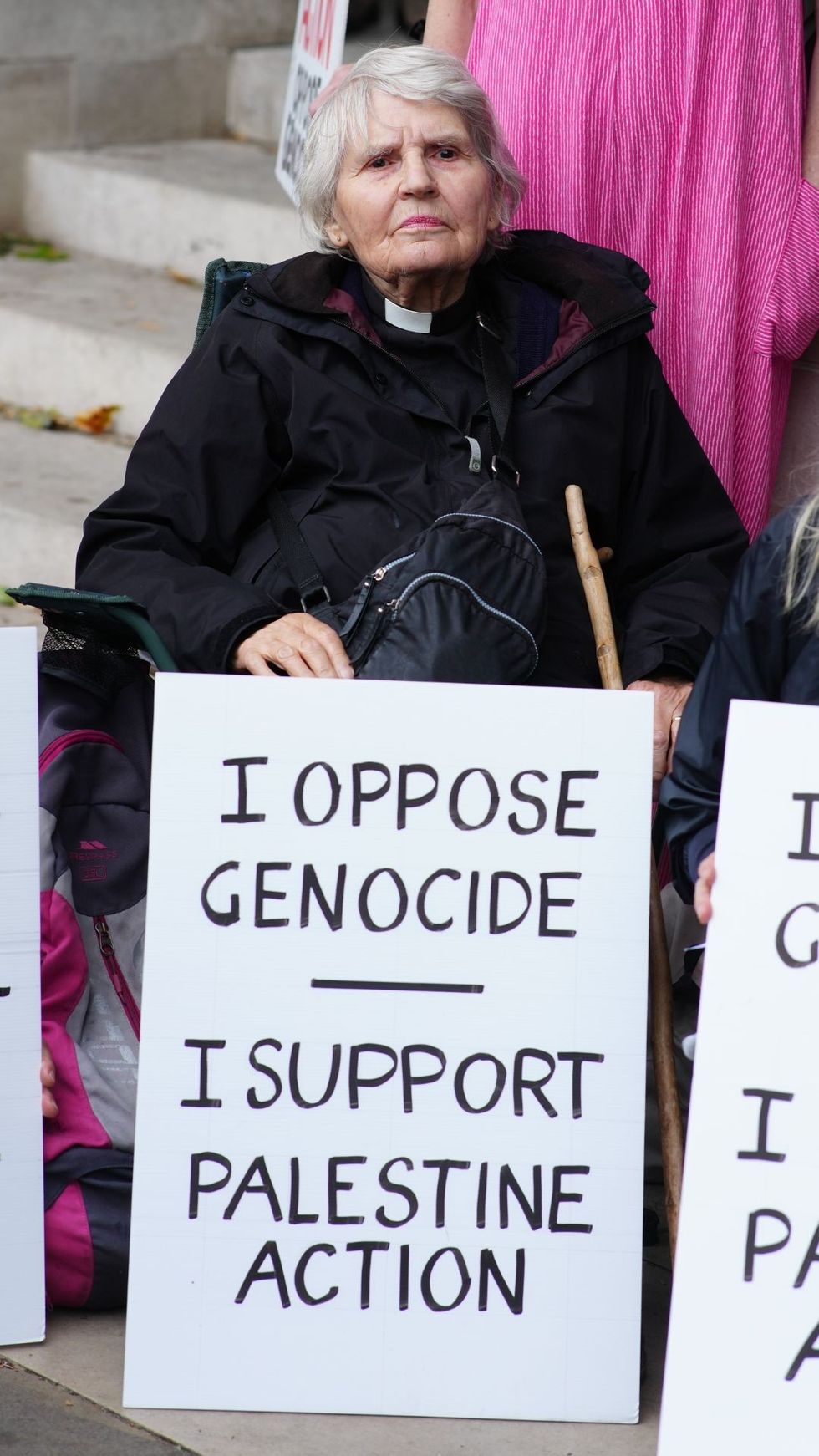 Protestors held up signs reading: 'I oppose genocide, I support Palestine Action'\u200b