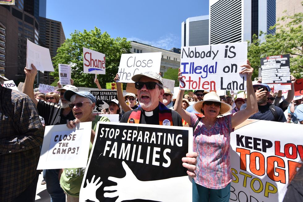 Protestors in front of the Byron G Rogers Federal building