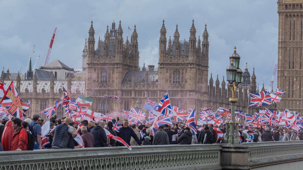 Protestors waiving the Union Jack in London