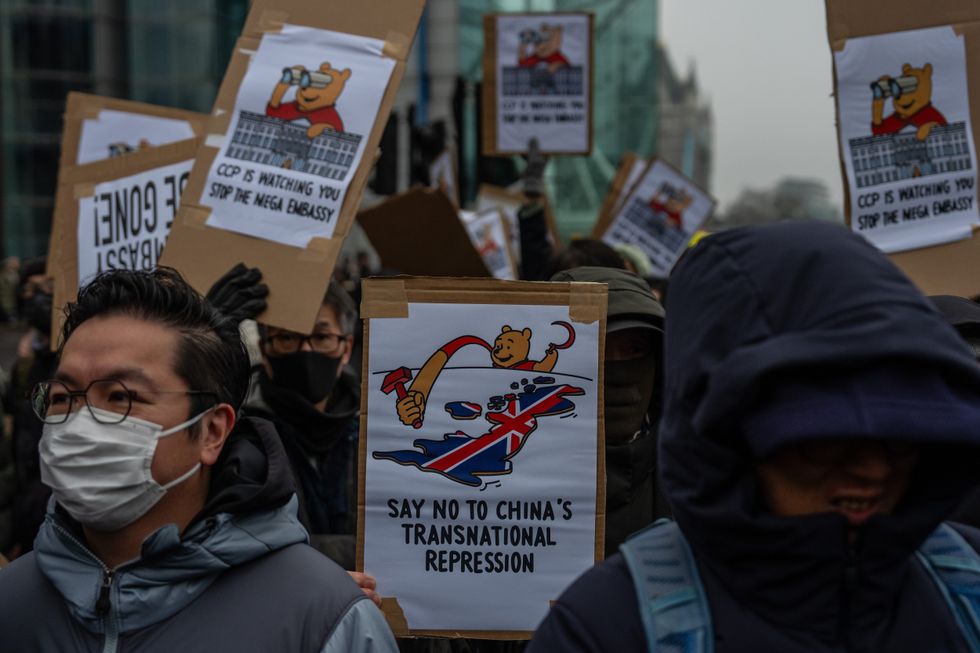 Protests at Chinese embassy in London