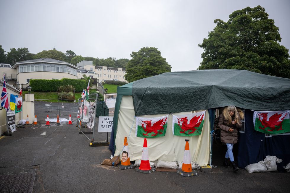 Protests outside migrant housing