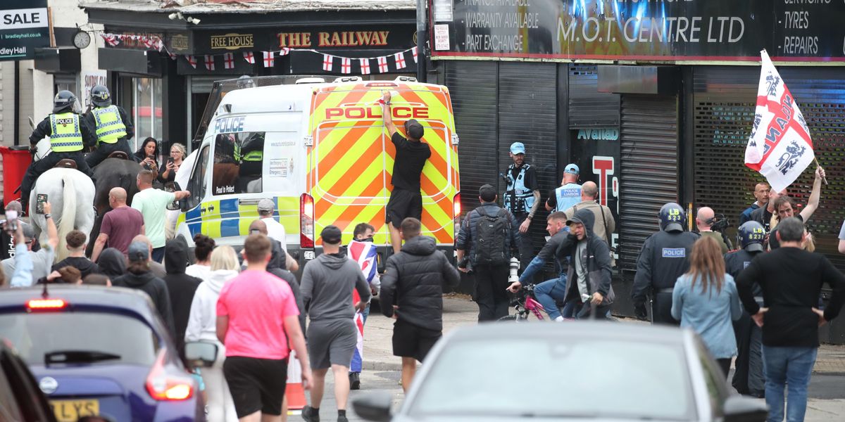 NextImg:Britain braces for weekend of riots and unrest as prison cells are cleared and lawyers put on standby