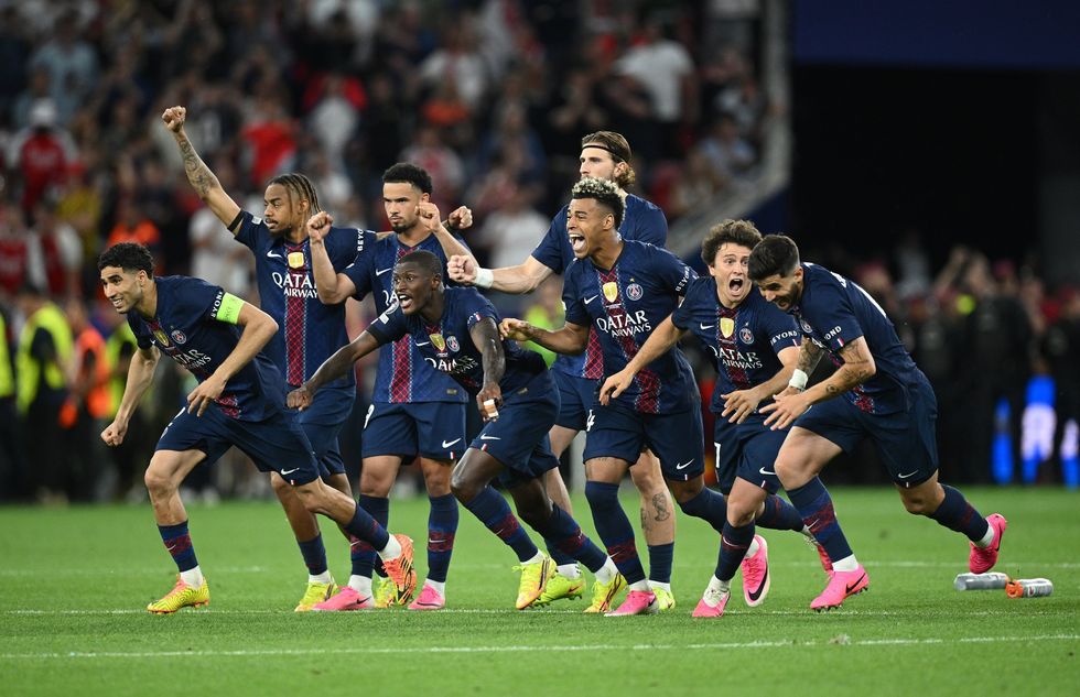 PSG players celebrate after their penalty shootout win over Arsenal in the Champions League final