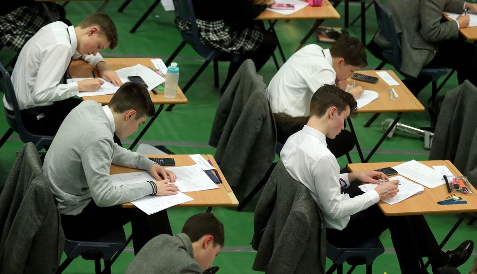 Pupils doing an exam in a school