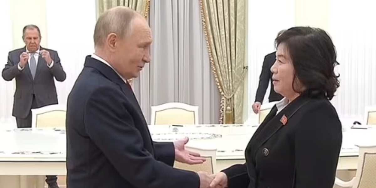 NextImg:Putin awkwardly shakes North Korean minister's hand for an entire minute