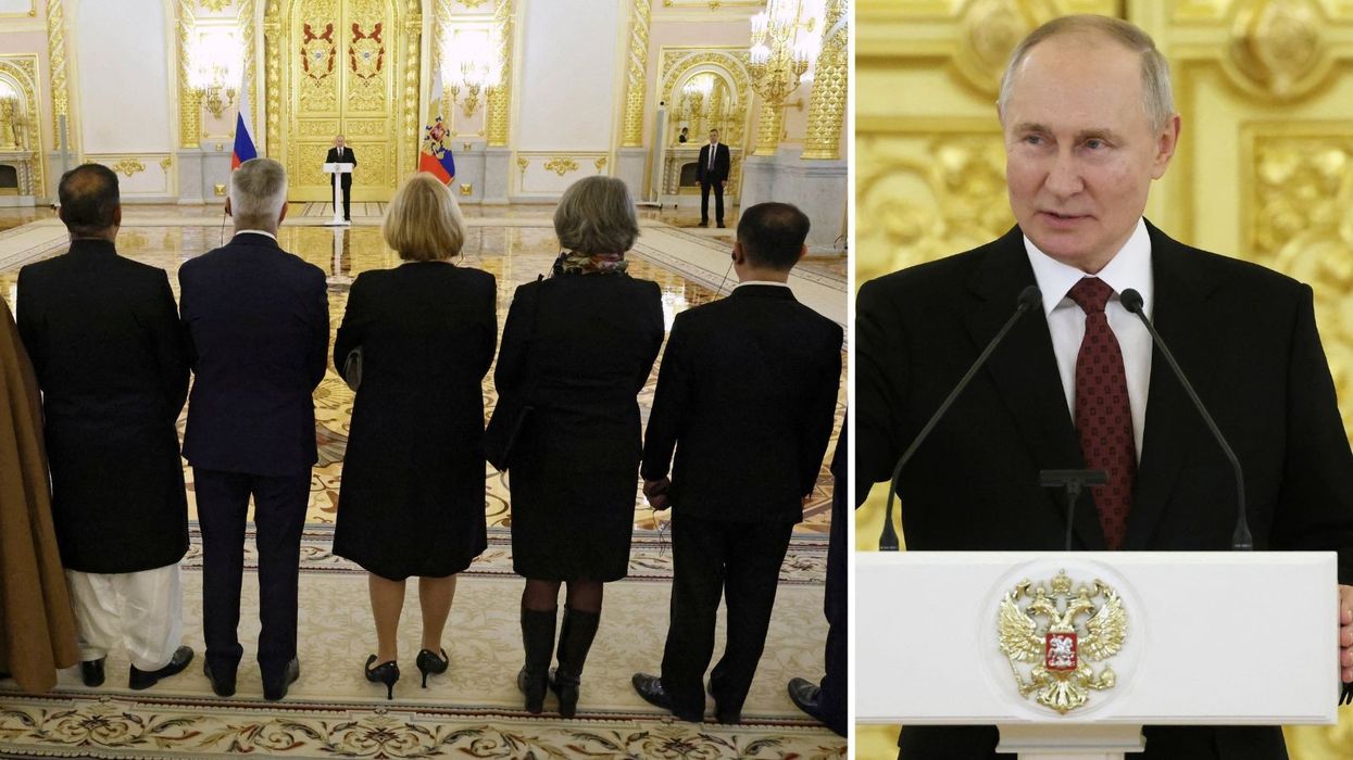 Putin stood 70ft away from foreign ambassadors