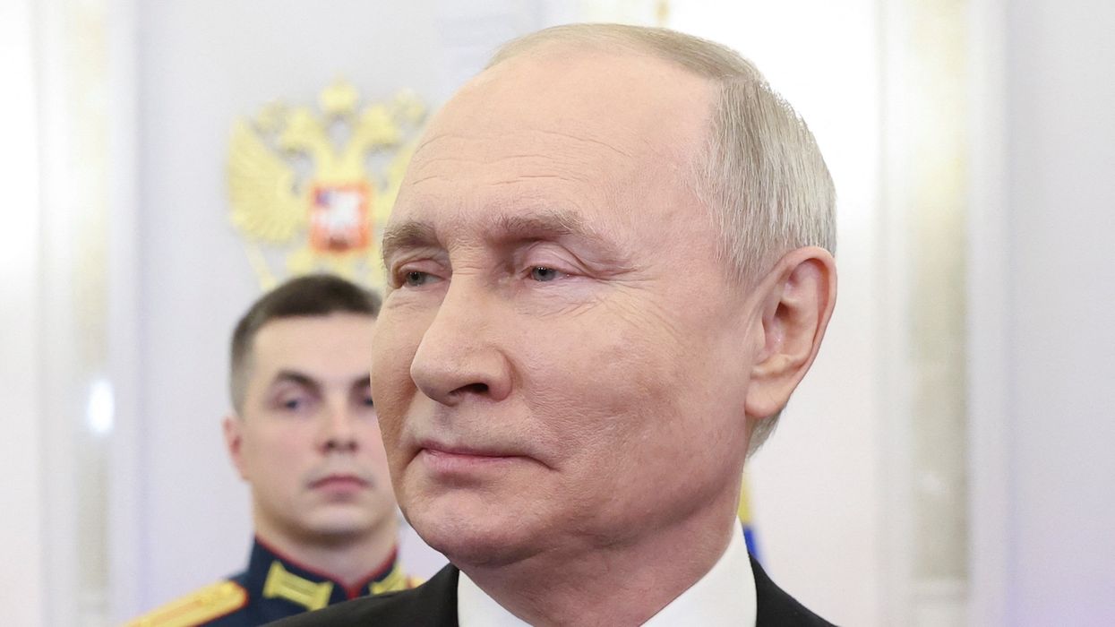 Putin shakes off health concerns as he confirms he WILL run for President again