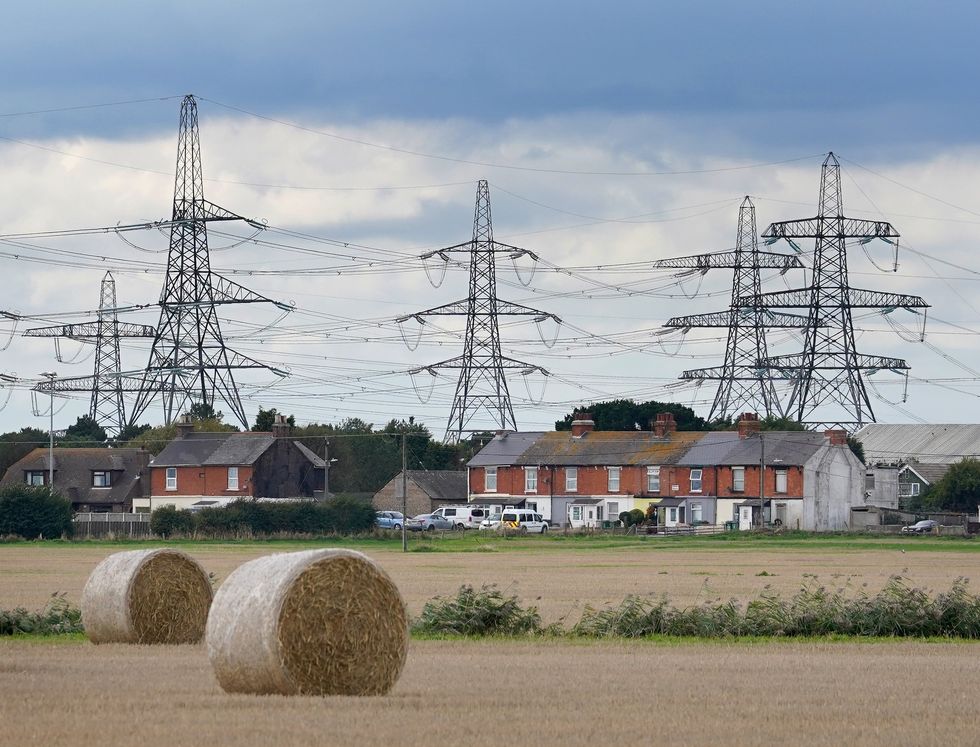 Pylons behind houses in Kent