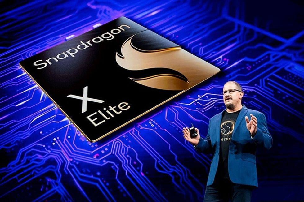 qualcomm executive pictured on stage talking about the new snapdrgon x processors
