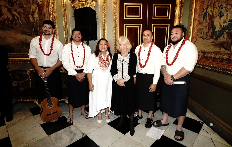 Queen Camilla and members of a Samoan band