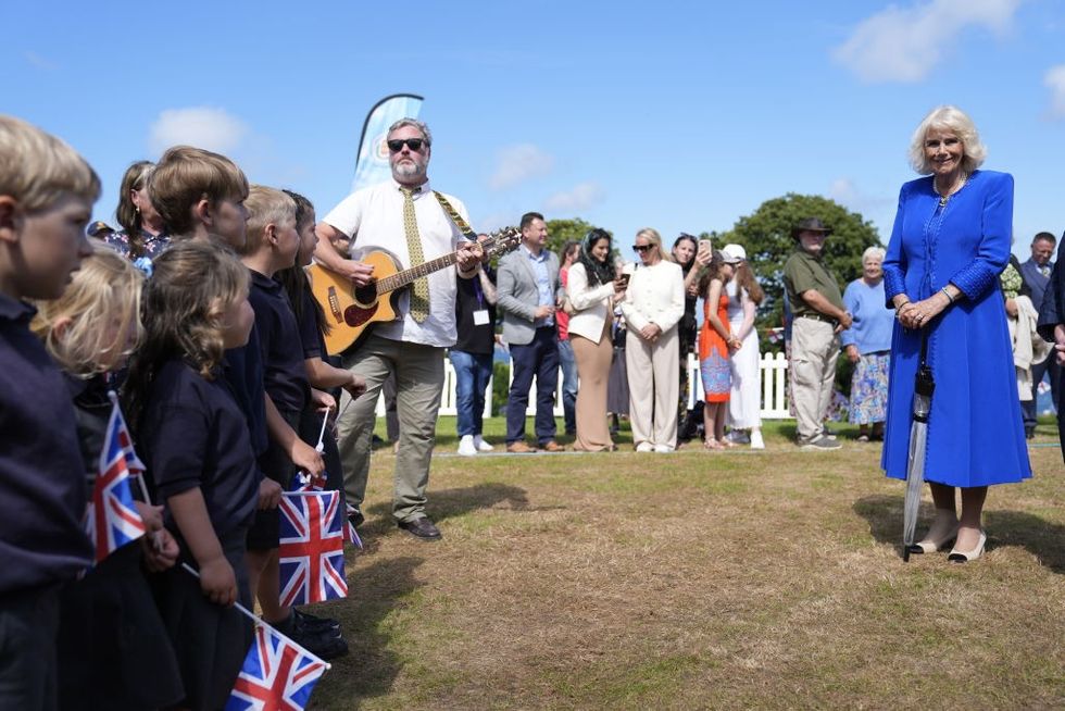 Queen Camilla meets schoolchildren on the Channel Islands