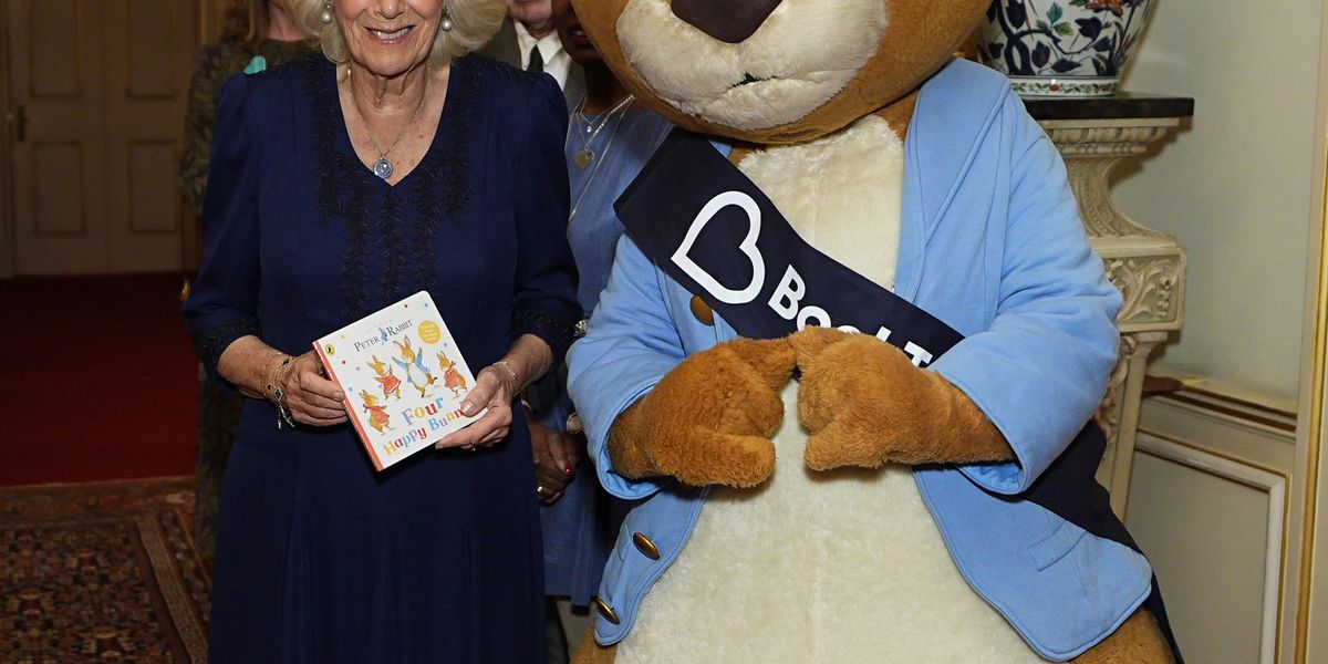 Queen Camilla poses with Peter Rabbit as she celebrates 100-year anniversary of children’s literature charity Queen Camilla poses with Peter Rabbit as she celebrates 100-year anniversary of children’s literature charity