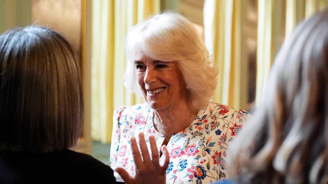 Queen Camilla smiles as she hosts a celebration for those who work to promote Scottish Literacy