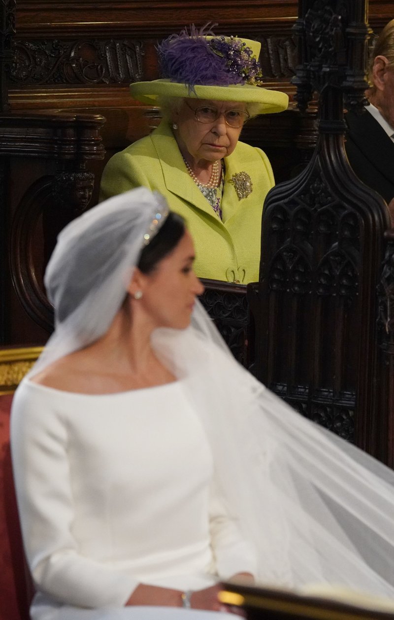 Meghan Markle's wedding dress savagely branded 'too white' by the late Queen