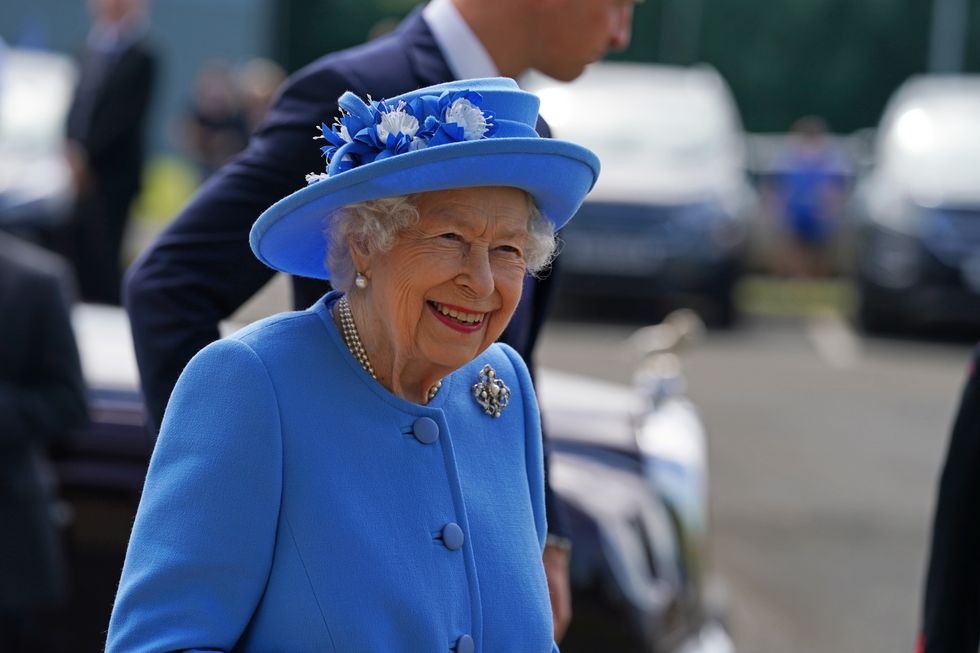 Queen Elizabeth II arrives for a visit to AG Barr's factory in Cumbernauld, where the Irn-Bru drink is manufactured, as part of her traditional trip to Scotland for Holyrood Week