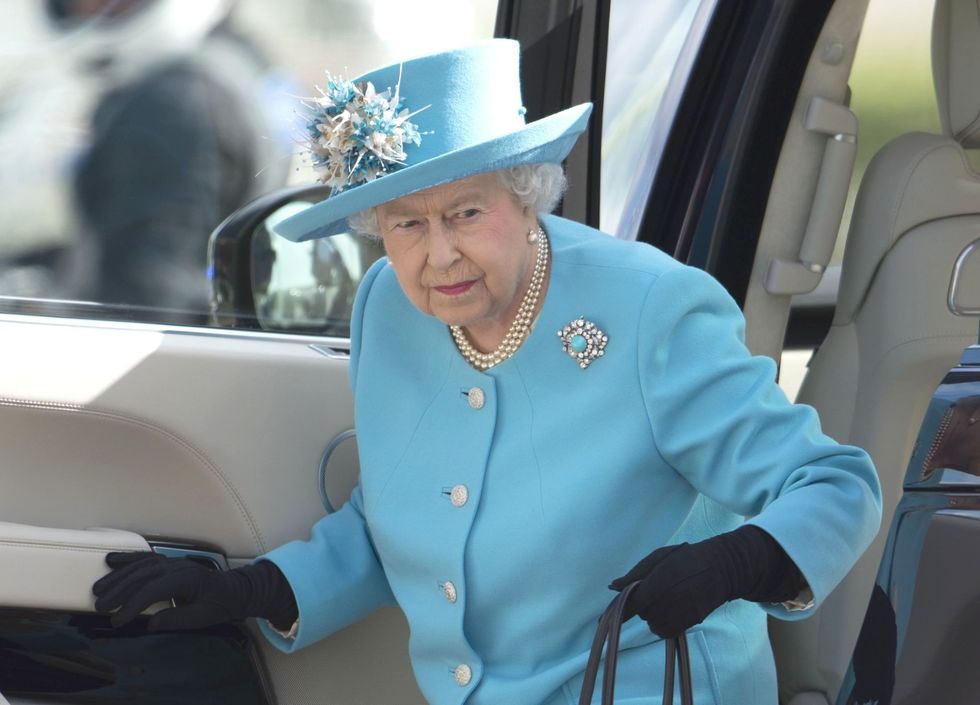 Queen Elizabeth II arrives for a visit to Malta Racing Club at Marsa racecourse near Valetta, Malta.
