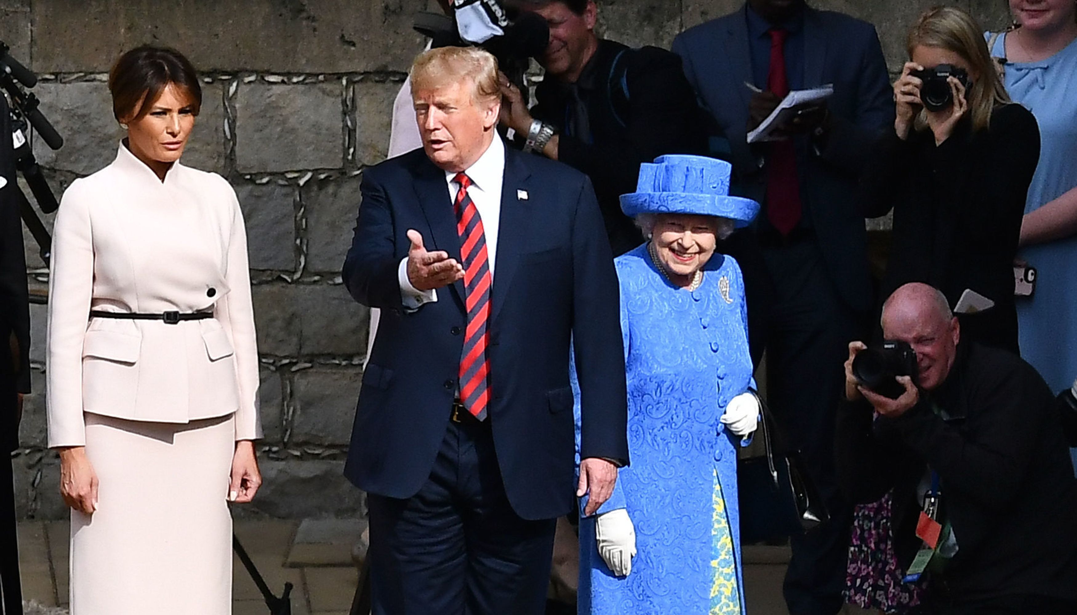 Queen Elizabeth II, US President Donald Trump and First Lady Melania Trump walk in the Quadrangle during a ceremonial welcome at Windsor Castle, Windsor.