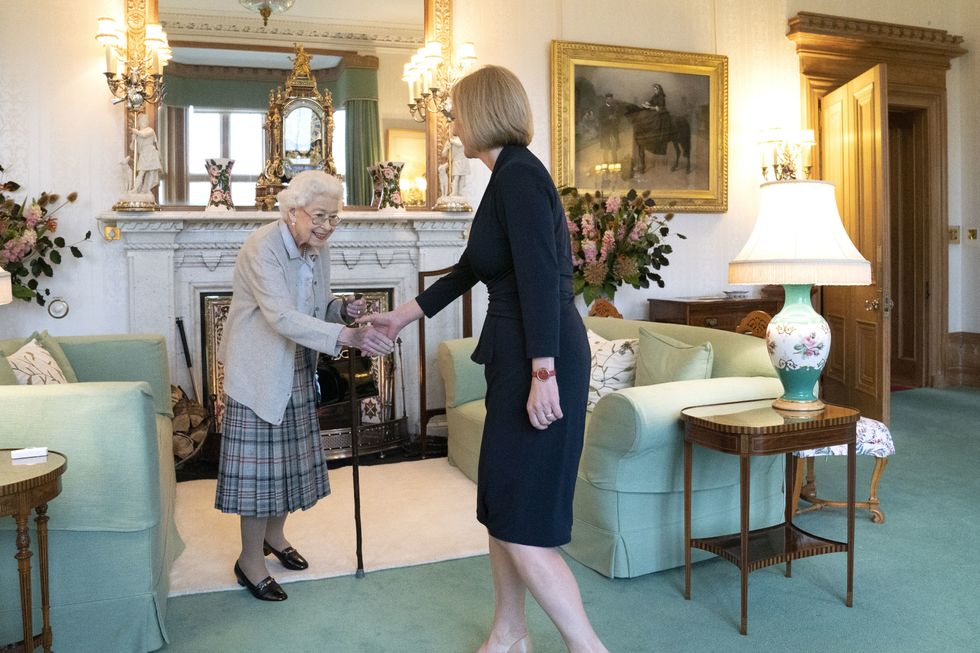 Queen Elizabeth II welcomes Liz Truss during an audience at Balmoral, Scotland, where she invited the newly elected leader of the Conservative party to become Prime Minister and form a new government. Picture date: Tuesday September 6, 2022.