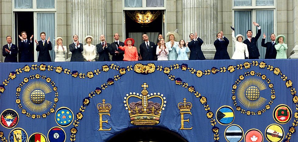 Queen Ellizabeth II surrounded by her family as they watch a flypast from the balcony of Buckingham Palace during Golden Jubilee celebrations in central London