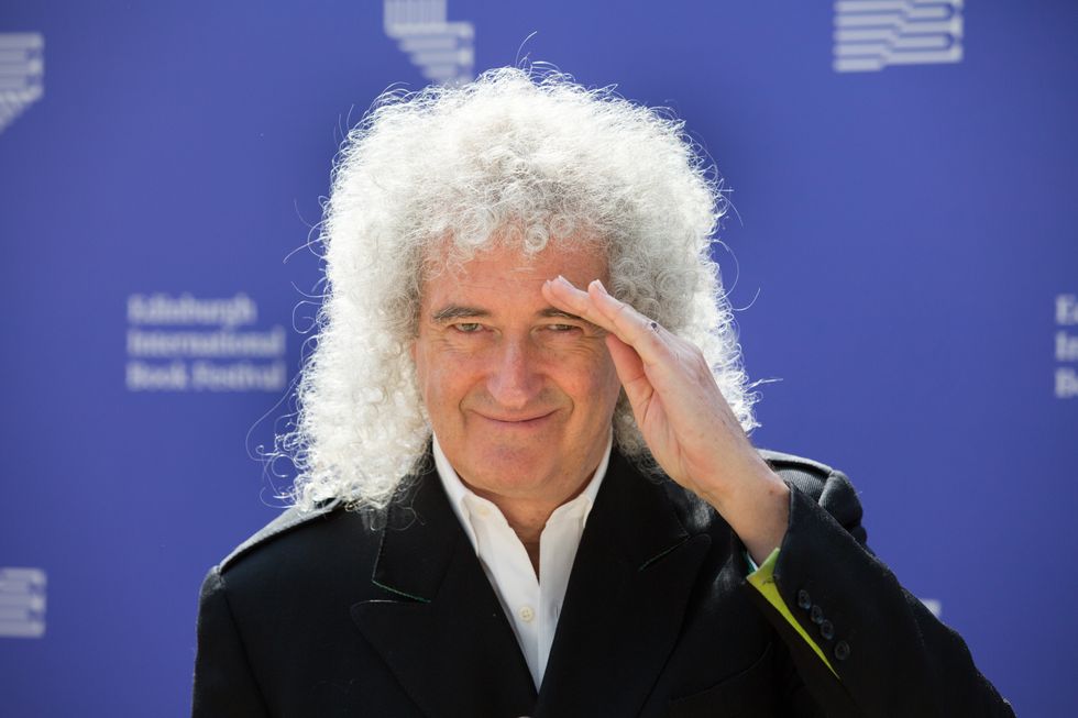 Queen guitarist Brian May will perform alongside Adam Lambert