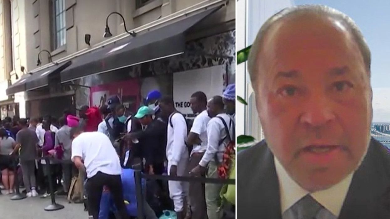 Queue of migrants and Bo Dietl