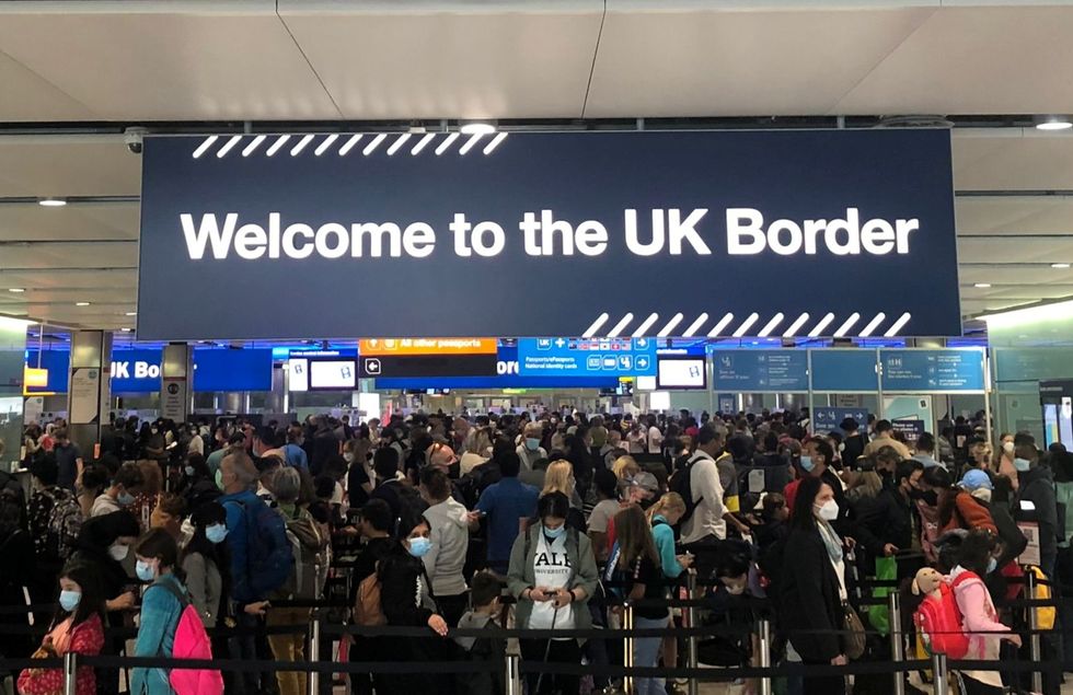 Queues of people wait in line at U.K. citizens arrivals at Heathrow Airport.