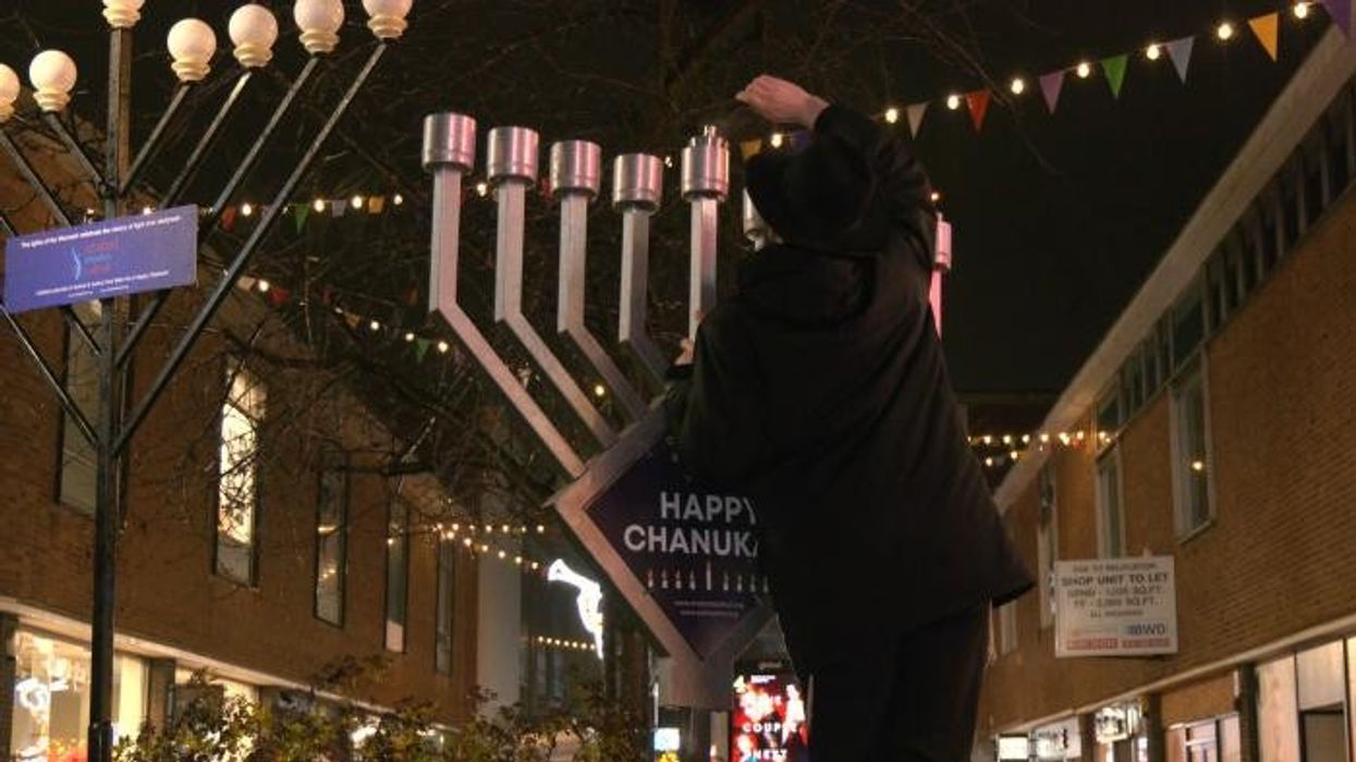 ‘We won’t be cowed by intolerance!’ Rabbi issues rallying cry as ‘terrified’ Jewish communities celebrate Hanukkah