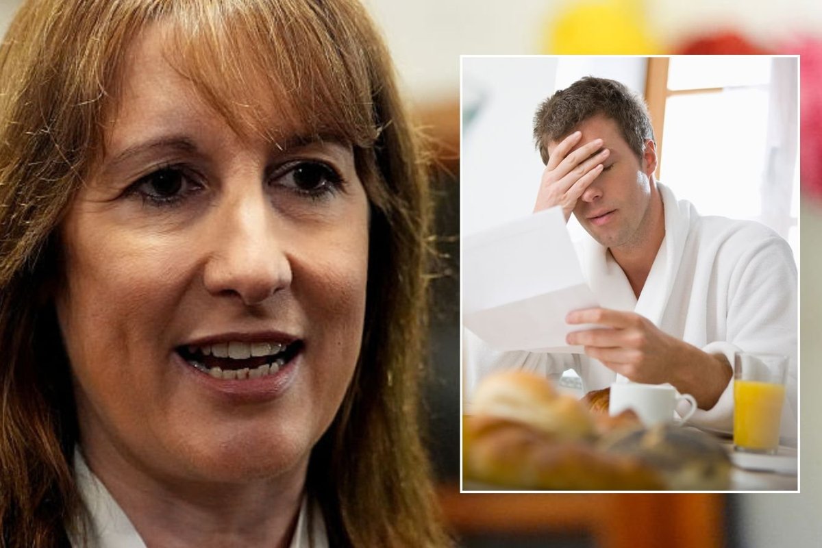 Rachel Reeves and man looking at letter