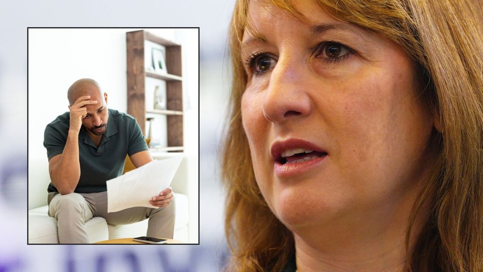 Rachel Reeves and man looking at letter