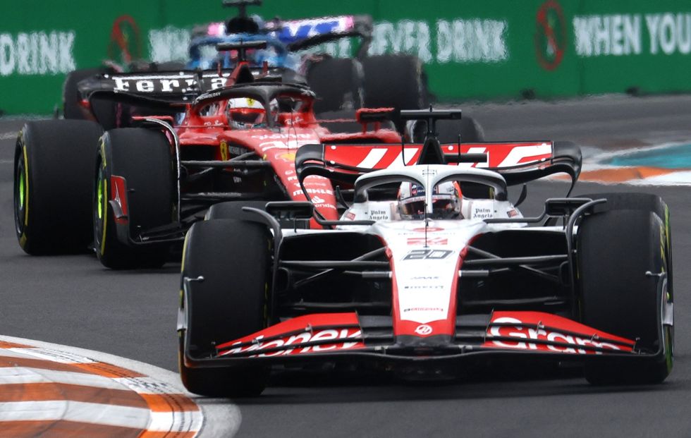 Racing cars competing at a Grand Prix