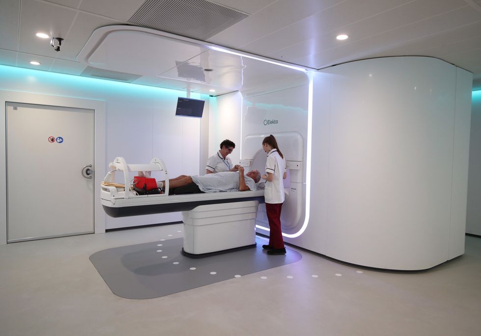 Radiographers Trina Herbert (left), and Gillian Smith with a patient at the Royal Marsden Hospital in Sutton Surrey.