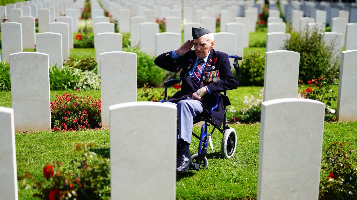 RAF veteran Bernard Morgan, 100, from Crewe, salutes the fallen ahead of the Royal British Legion Service of Commemoration to mark the 80th anniversary of D-Day, at Bayeux War Cemetery in Normandy, France