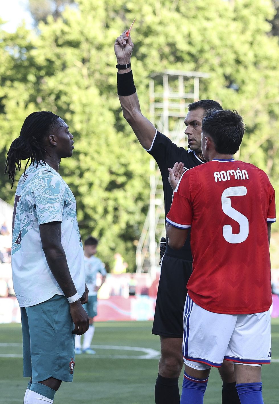 Rafael Leao was sent off for violent conduct after hitting Ivan Roman in the face