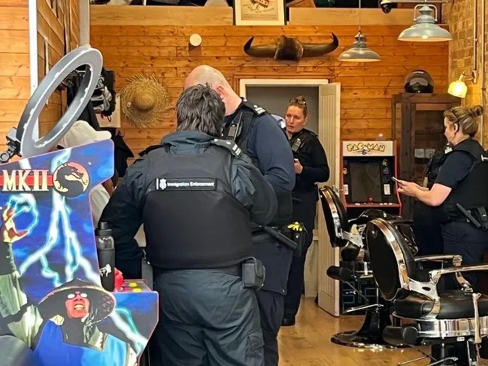 Raids have taken place at Turkish barbershops across the UK