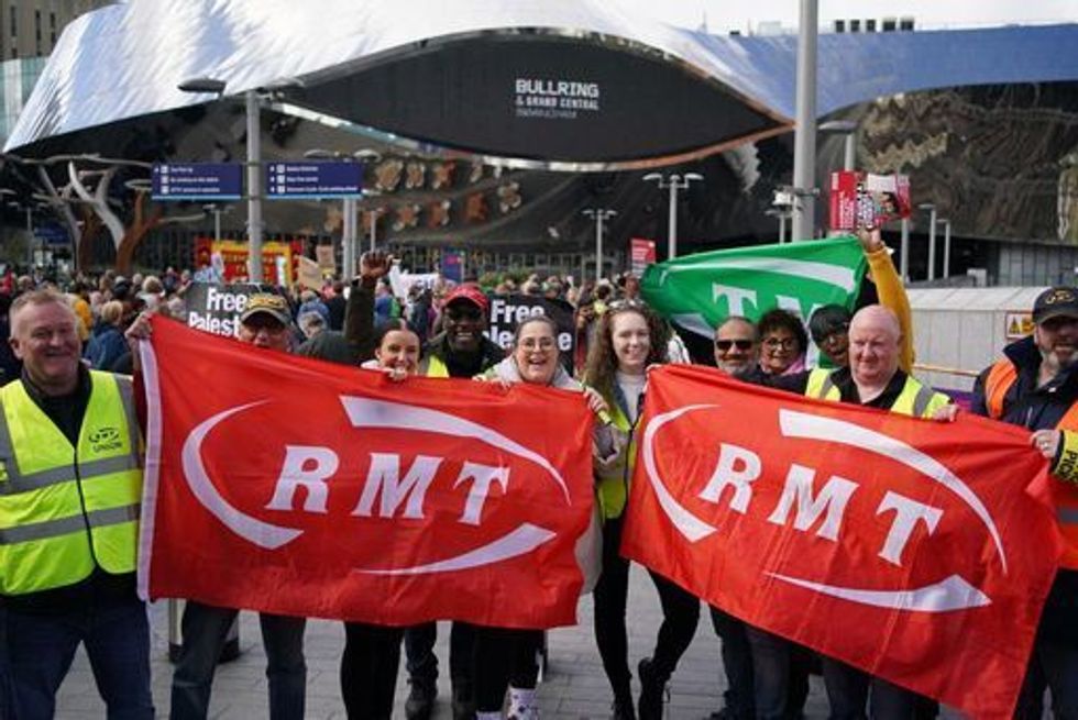Rail workers on the picket line outside the Bullring and Grand Central in Birmingham during previous walkout
