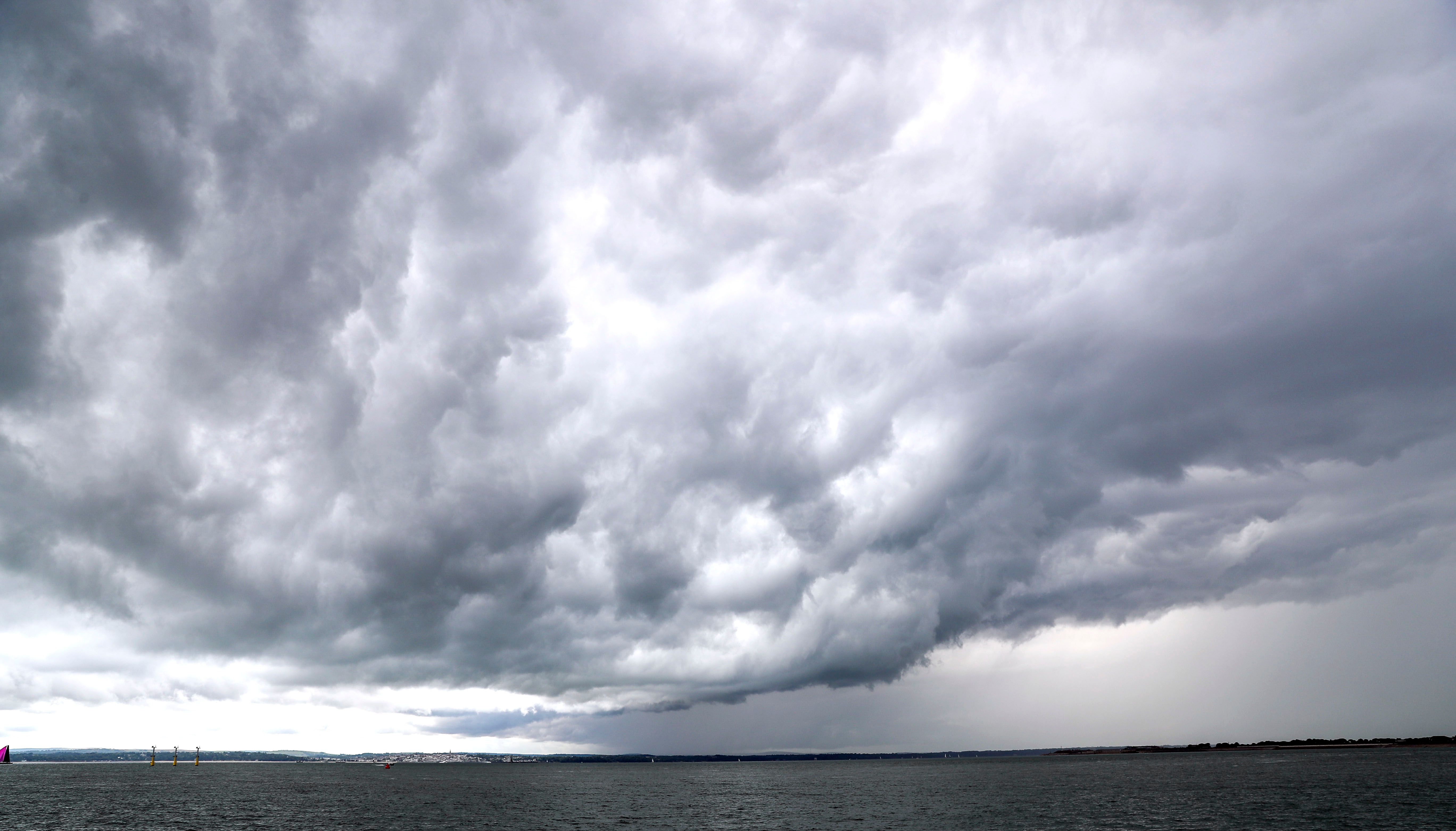 Rain clouds over the sea in Southsea, Hampshire, as thunderstorms are due across the south-east.